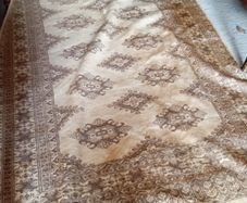 Vintage handwoven fringed rug.