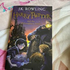 Harry Potter & the philosopher's stone paperback book