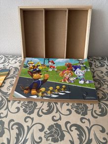 3 Paw patrol puzzles with wooden storage box & base