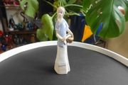 Spanish porcelain figurine  - Woman with a basket