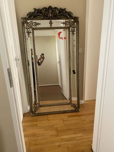 ornate silver mirror