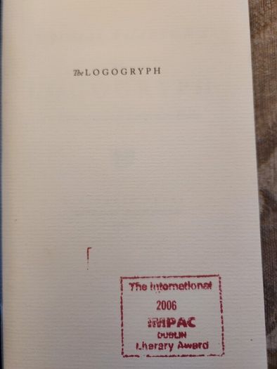 The Logogryph. By Thomas Wharton. First Edition Complete With Presentation Sleeve Paperback In Very Good Condition. 37