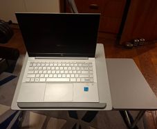 Adjustable laptop tray