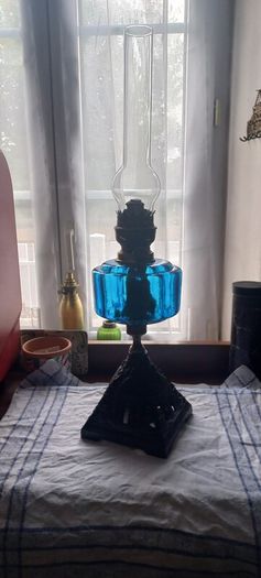 Antique Blue Glass Brass and cast iron metal large table oil lamp in very good condition and working