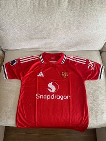 Manchester United home, away and third kits