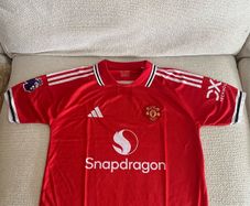 Manchester United home, away and third kits