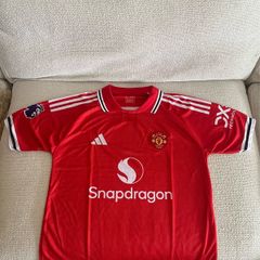 Manchester United home, away and third kits