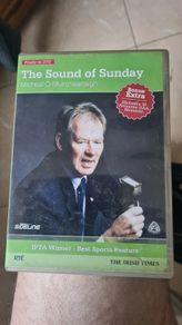 The Sound of Sunday - Micheal O`Muircheartaigh - DVD. (Never opened) RARE VINTAGE. The life story of an Irish broadcasting legend but also provides you with Micheal's top GAA moments filmed exclusively for this DVD.