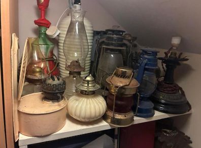 Collection of 14 vintage oil lamps and lanterns