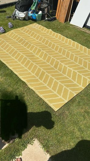 Garden table and outdoor rug