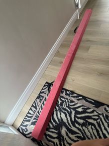 Folding gymnastic beam