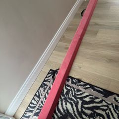 Folding gymnastic beam