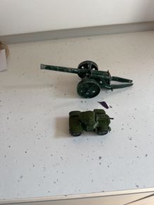 dinky armoured car and die-cast field gun