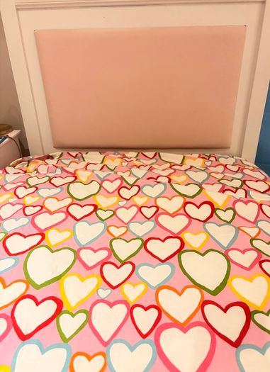 Wooden Single bed with Pink Headboard