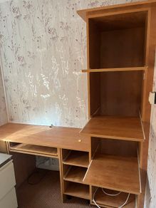 Wooden office desk and shelving unit