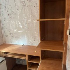 Wooden office desk and shelving unit