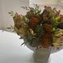 Autumnal faux flower display in ceramic vase Image 3