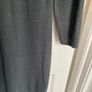 NAF NAF fine knit jumper dress in a rich dark green shade. Image 6