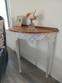 Half moon shaped side table