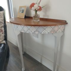 Half moon shaped side table