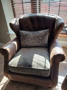 Chesterfield couch & 2 single chairs in brown leather and sage green cushions. Perfect condition,  non smokers, no house pets.  Couch Width 7ft, Depth 4ft. Chairs Width 3ft2ins, Depth 3ft