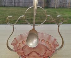 Vintage pink glass jam bowl with silver-plated stand and spoon.