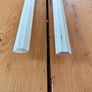 Two 2.4m lengths of white wooden moulding 10x10mm Image 3