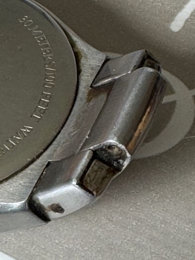 Relic face changing watch with broken watchstrap