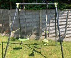 Climbing frame with slide and swing
