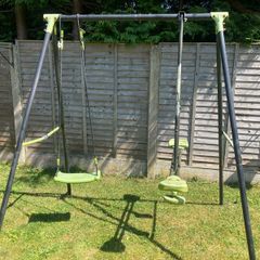 Climbing frame with slide and swing