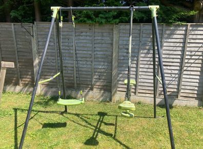 Climbing frame with slide and swing