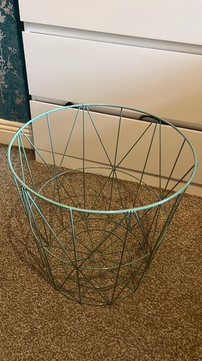 Side table with storage basket