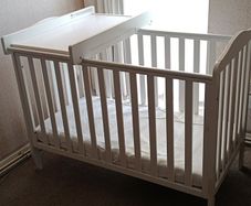 baby cot with changing table