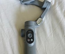 IZI GO-X 3-Axis Smartphone Gimbal with Wireless Charging, Creative Modes, OLED Display, AI Face Tracking & 10H Battery