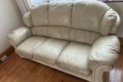 Cream leather couch (solid timber frame)