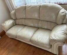Cream leather couch (solid timber frame)