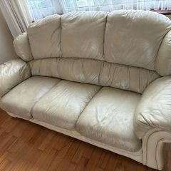 Cream leather couch (solid timber frame)