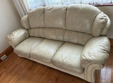 Cream leather couch (solid timber frame)