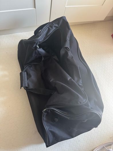4 black wheelie bags
