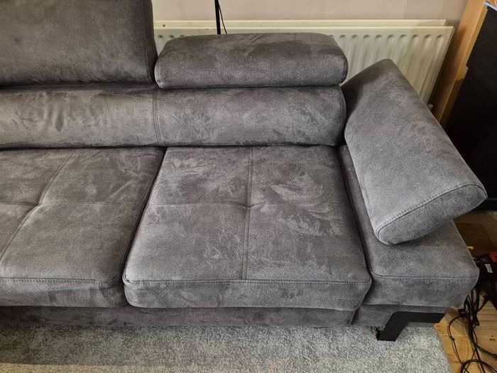 dark grey corner sofa with sleeping and storage