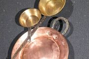 Large antique copper and brass pans