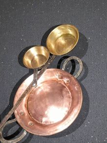 Large antique copper and brass pans