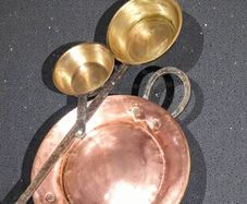 Large antique copper and brass pans