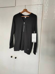 women's Bodylogic sports top.