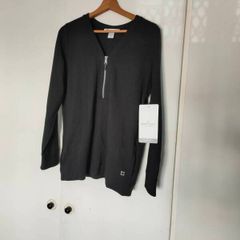 women's Bodylogic sports top.