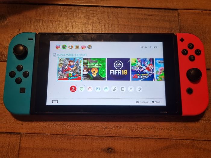 Nintendo Switch Standard Bundle + Case & 3 Top Games (Mario, Minecraft)