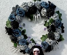 Halloween wreath with roses, skeletons and spiders
