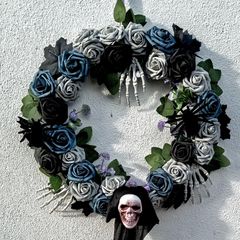 Halloween wreath with roses, skeletons and spiders