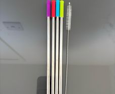 4 Stainless Steel straws with colorful silicone tips and 1 cleaning brush