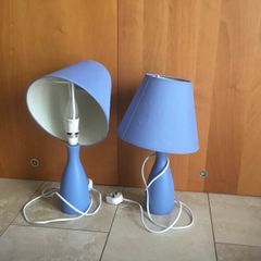 Two blue bedside lamps